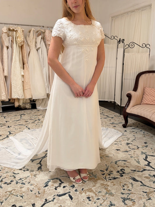Vintage 60s column wedding dress with floral applique and dramatic train