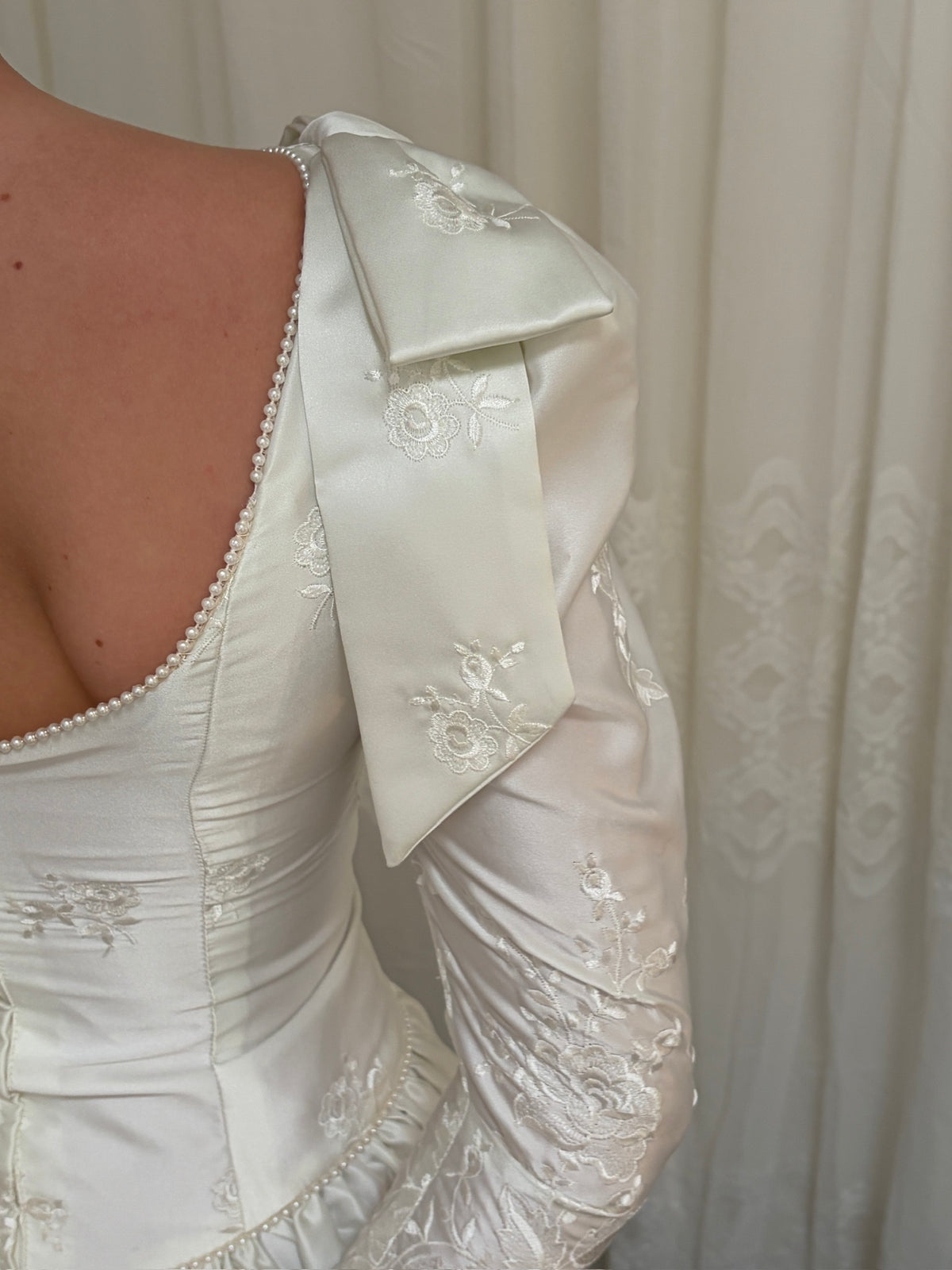 Vintage 80s satin basque waist long sleeve wedding gown with bows