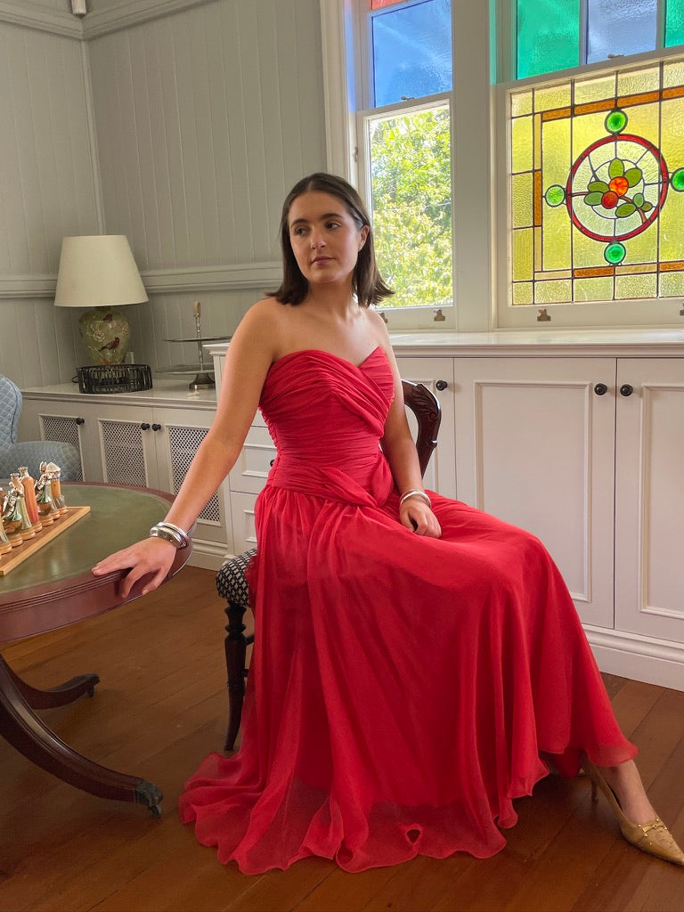 Vintage 80s red strapless basque waist gown with pleated bodice
