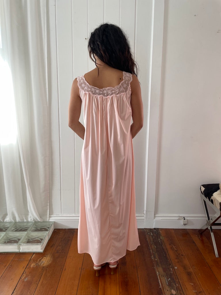 Vintage 1960s Vanity Fair pink slip dress with lace trim and bow