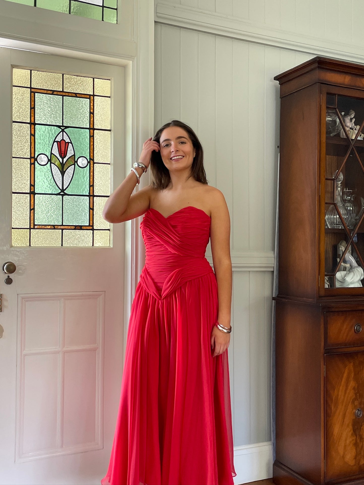 Vintage 80s red strapless basque waist gown with pleated bodice