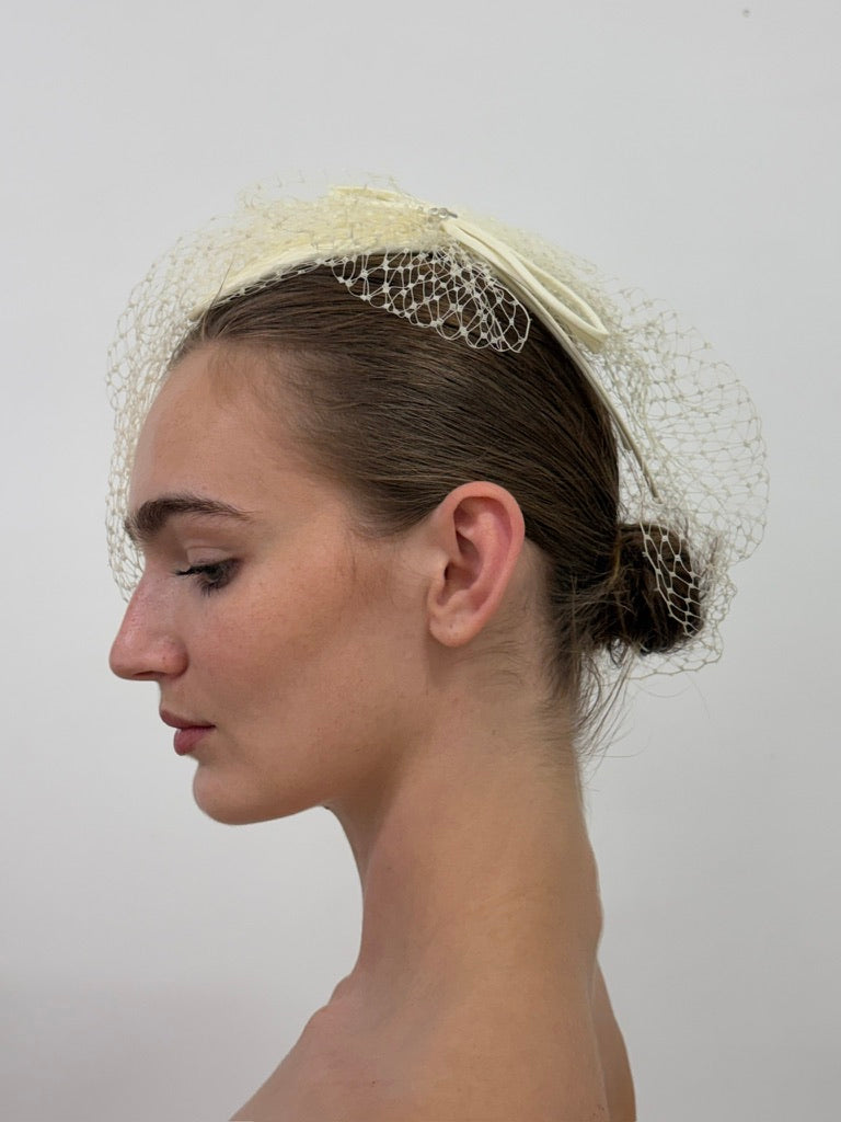 Vintage 80s cream satin bridal hat with birdcage veil