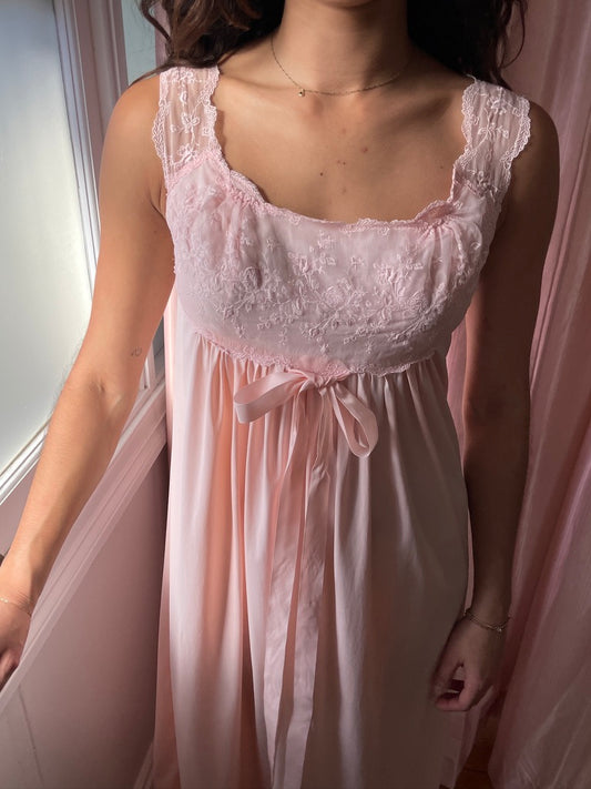 Vintage 1960s Vanity Fair pink slip dress with lace trim and bow