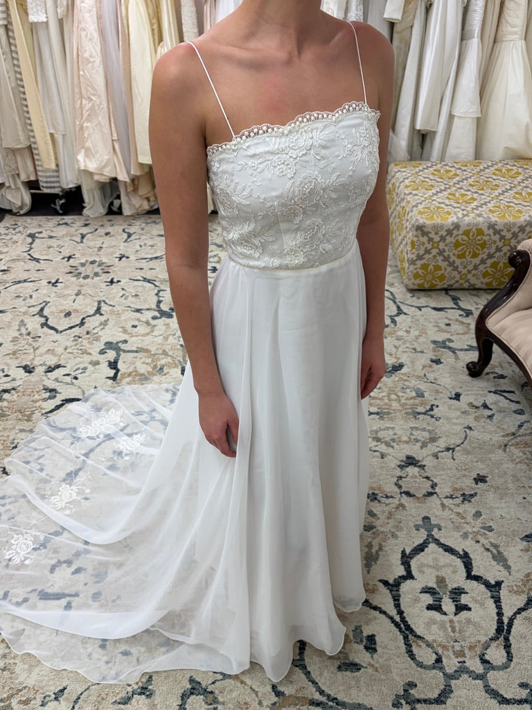 Vintage 70s ivory wedding dress with long sleeve bolero and train