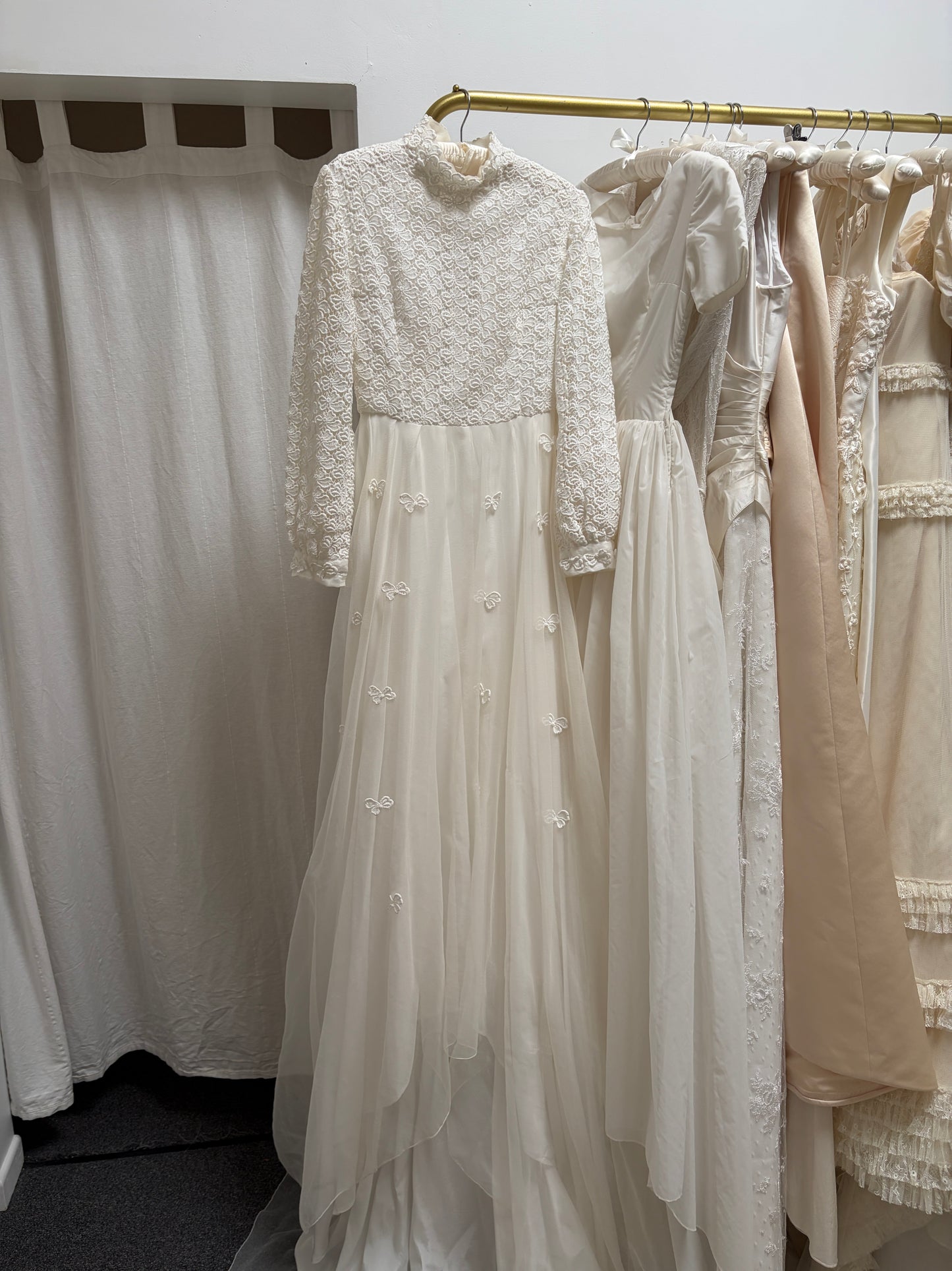 Vintage 60s long sleeve guipure lace wedding gown with applique train