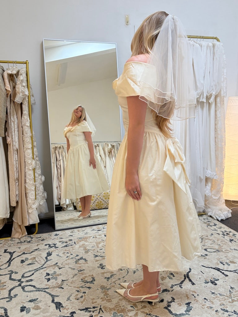 Vintage 90s cream off shoulder tea length basque waist wedding dress with rosette