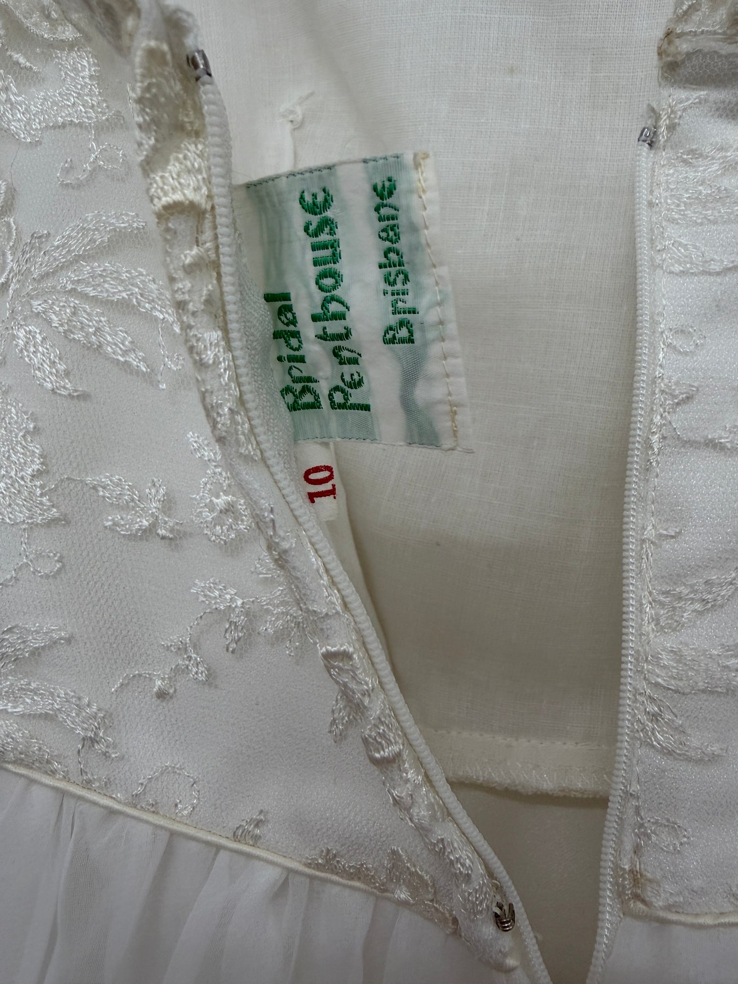 Vintage 70s ivory wedding dress with long sleeve bolero and train
