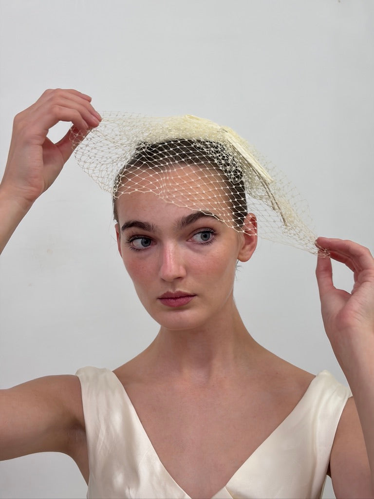 Vintage 80s cream satin bridal hat with birdcage veil