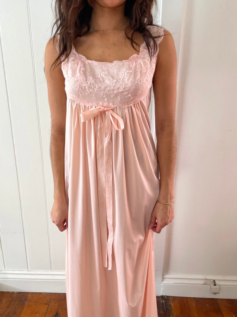 Vintage 1960s Vanity Fair pink slip dress with lace trim and bow