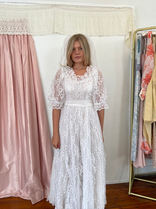 Vintage 80s lace puff sleeve wedding dress with bow
