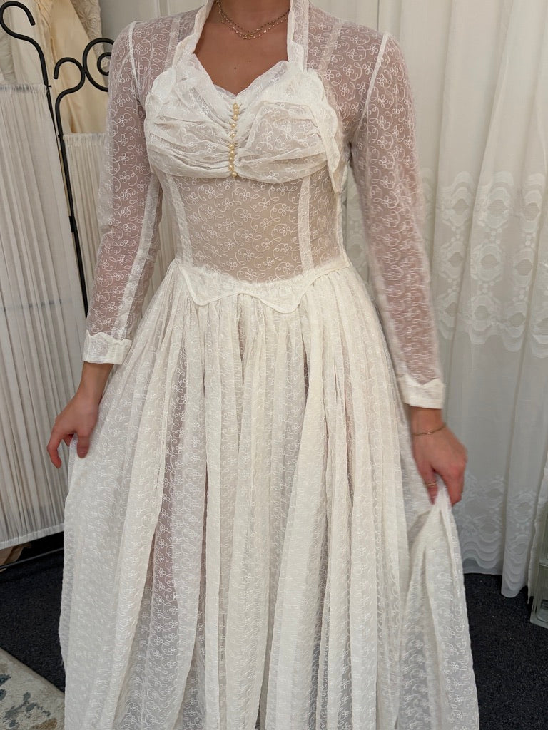 Vintage 60s long sleeve semi sheer lace high neck wedding gown