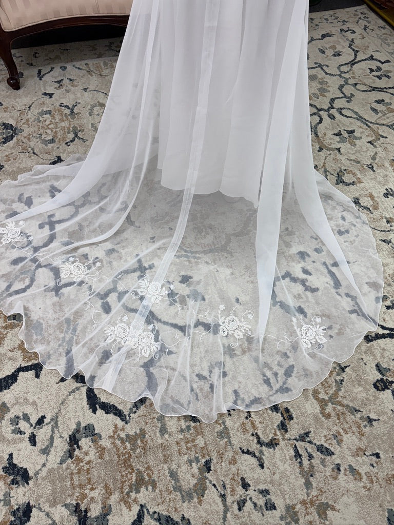 Vintage 70s ivory wedding dress with long sleeve bolero and train