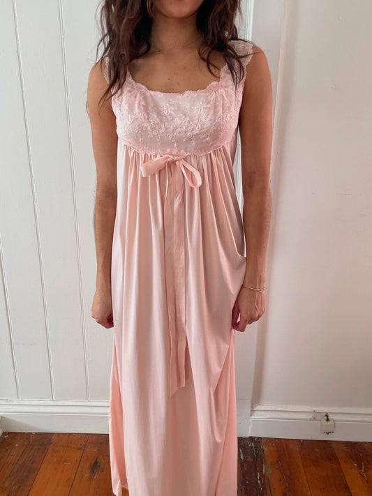 Vintage 1960s Vanity Fair pink slip dress with lace trim and bow