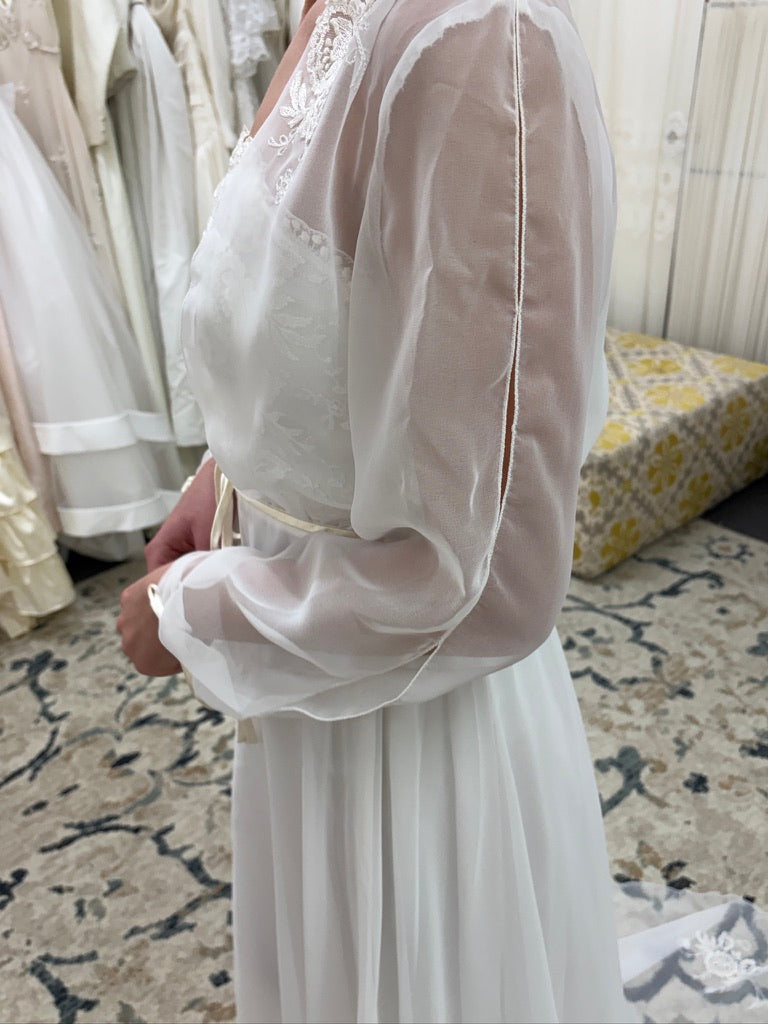 Vintage 70s ivory wedding dress with long sleeve bolero and train